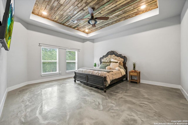 1547 Moon Vw, New Braunfels, TX 78132 - bedroom featuring a tray ceiling, baseboards, concrete flooring, wooden ceiling, and ceiling fan