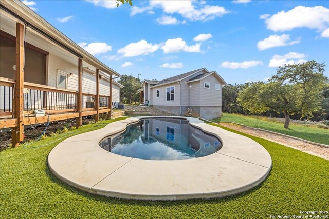 1547 Moon Vw, New Braunfels, TX 78132 - view of pool with a wooden deck and a lawn