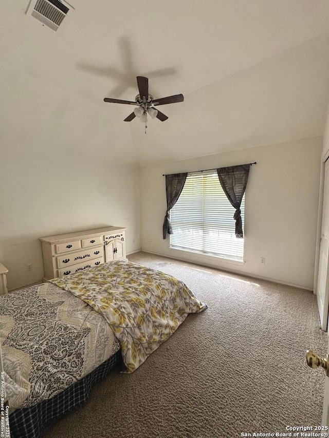 607 Dover Ln, Round Rock, TX 78664 - bedroom featuring a ceiling fan, visible vents, vaulted ceiling, and carpet floors