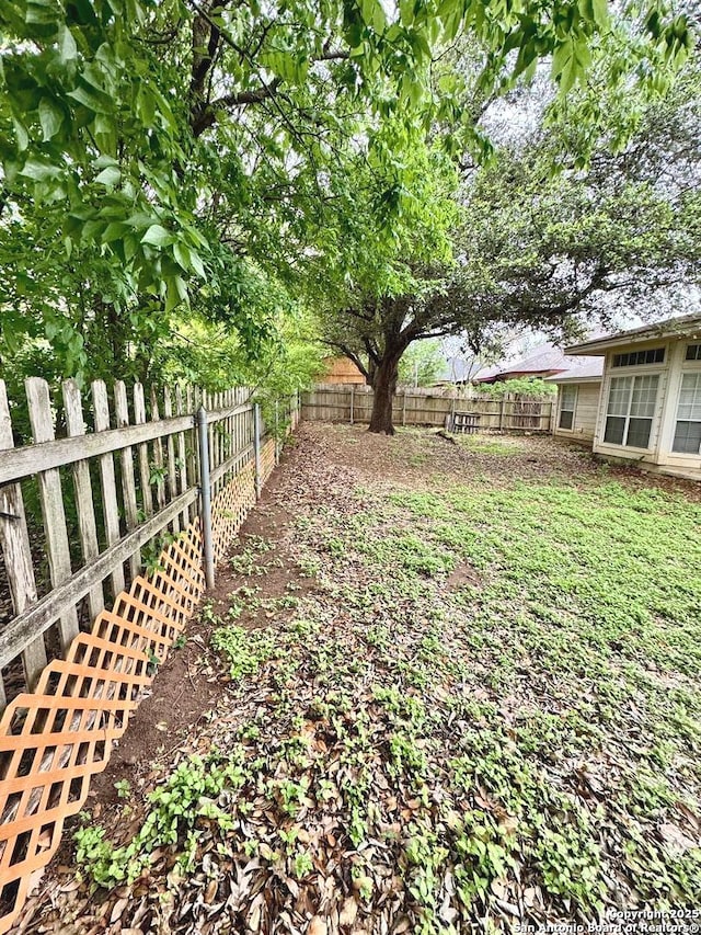 607 Dover Ln, Round Rock, TX 78664 - view of yard featuring a fenced backyard