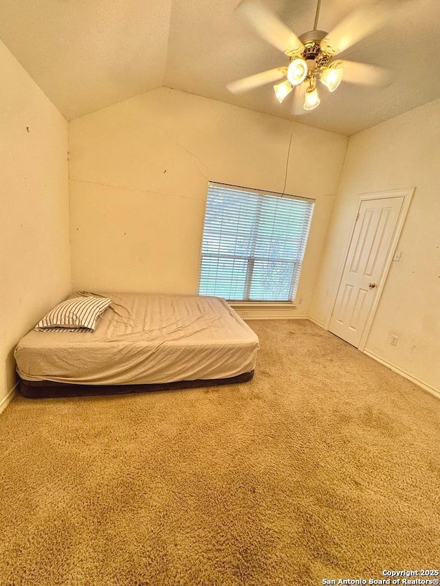 607 Dover Ln, Round Rock, TX 78664 - bedroom featuring baseboards, a ceiling fan, carpet flooring, and vaulted ceiling