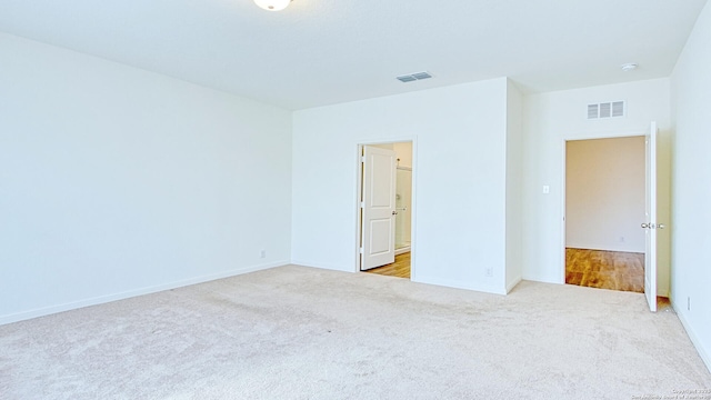 13406 Flower Pond, Saint Hedwig, TX 78152 - unfurnished bedroom featuring baseboards, visible vents, and carpet floors