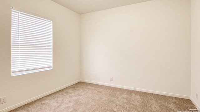 13406 Flower Pond, Saint Hedwig, TX 78152 - unfurnished room with light carpet and baseboards
