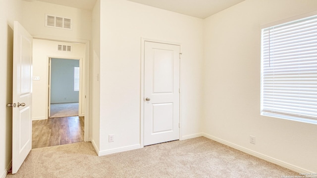 13406 Flower Pond, Saint Hedwig, TX 78152 - unfurnished bedroom featuring carpet flooring, visible vents, and baseboards