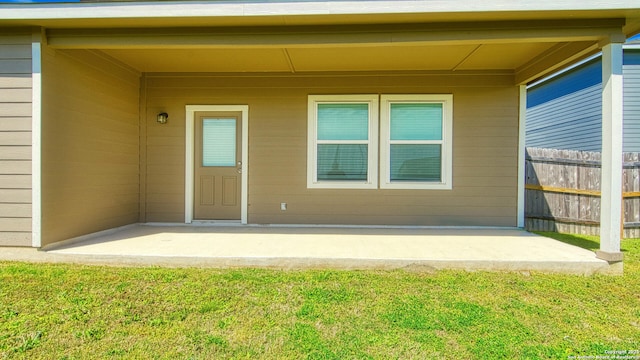 13406 Flower Pond, Saint Hedwig, TX 78152 - doorway to property with a lawn, fence, and a patio area