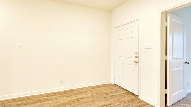 13406 Flower Pond, Saint Hedwig, TX 78152 - foyer with baseboards and light wood-type flooring