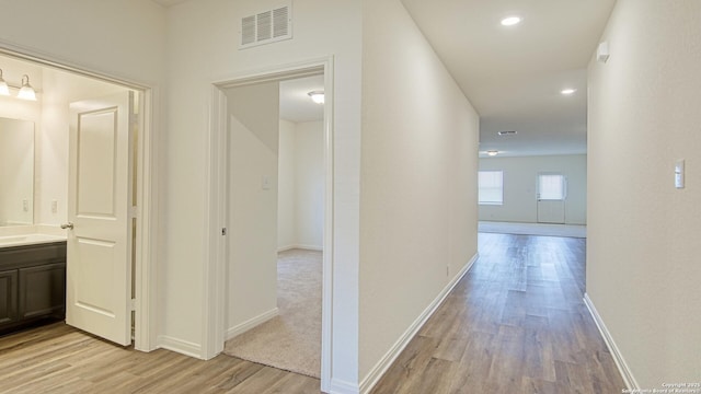 13406 Flower Pond, Saint Hedwig, TX 78152 - corridor featuring light wood finished floors, recessed lighting, visible vents, and baseboards