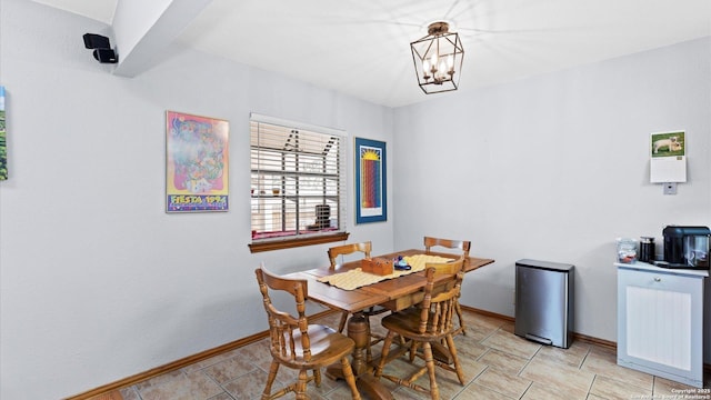 8422 Timber Crst, San Antonio, TX 78250 - dining space with baseboards and a chandelier