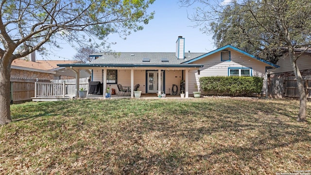 8422 Timber Crst, San Antonio, TX 78250 - back of property featuring fence, a chimney, a yard, and a patio area
