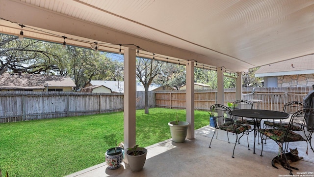 8422 Timber Crst, San Antonio, TX 78250 - view of patio with a fenced backyard and outdoor dining area