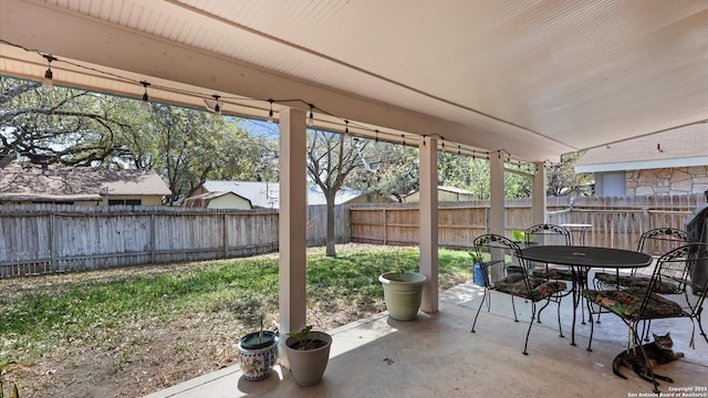 8422 Timber Crst, San Antonio, TX 78250 - view of patio with outdoor dining space and a fenced backyard