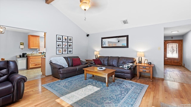 8422 Timber Crst, San Antonio, TX 78250 - living room with a ceiling fan, visible vents, light wood-style flooring, and high vaulted ceiling