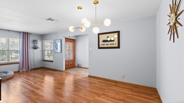 8422 Timber Crst, San Antonio, TX 78250 - interior space featuring wood finished floors, visible vents, and baseboards