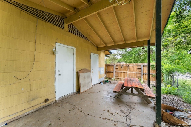 view of patio / terrace featuring fence