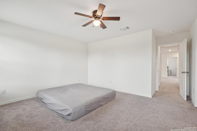 bedroom with a ceiling fan, baseboards, visible vents, and light carpet