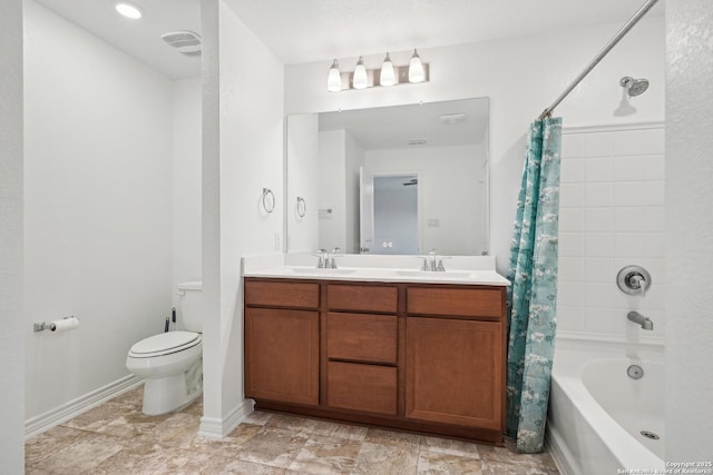 full bathroom with double vanity, a sink, shower / bathtub combination with curtain, and toilet