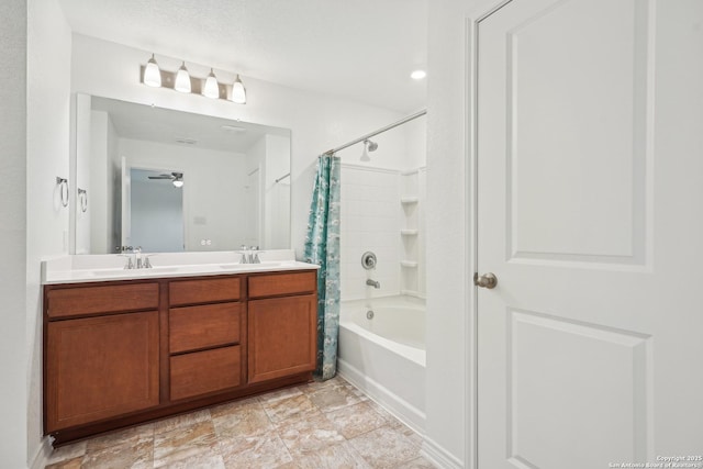 full bath featuring a sink, double vanity, and shower / bath combination with curtain