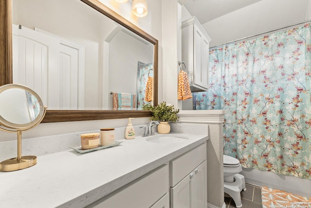 bathroom featuring vanity, toilet, shower / bath combination with curtain, and tile patterned flooring