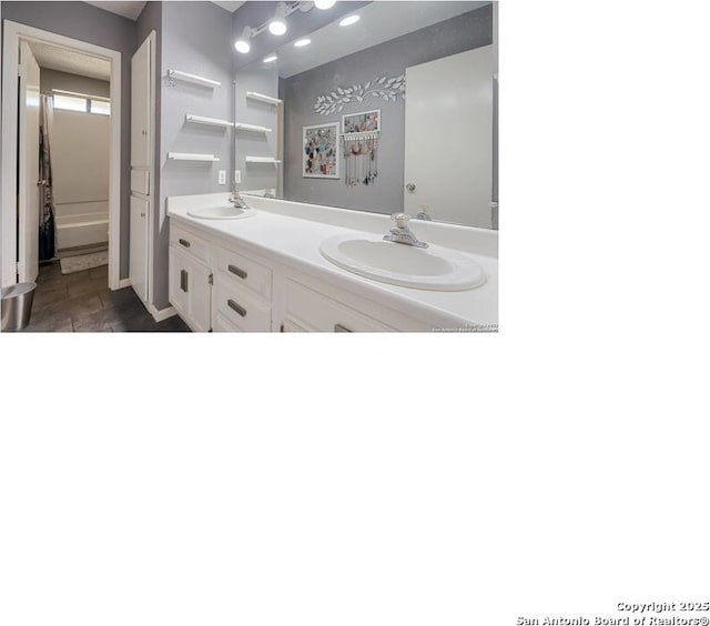 342 Turner, Pleasanton, TX 78064 - bathroom featuring double vanity and a sink