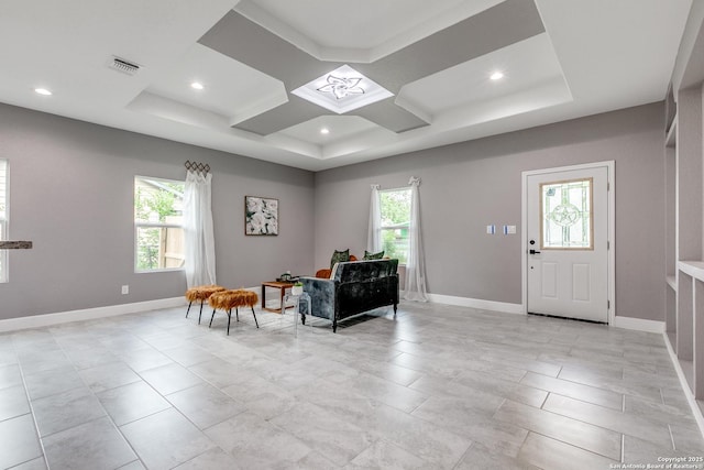 foyer entrance with coffered ceiling, recessed lighting, visible vents, and baseboards