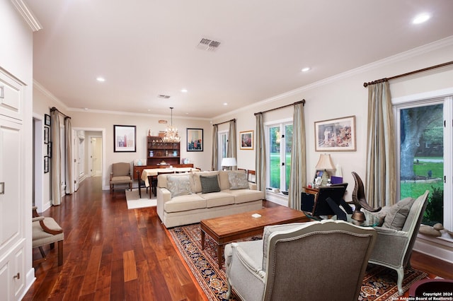 living area featuring dark wood-style flooring, visible vents, an inviting chandelier, and recessed lighting