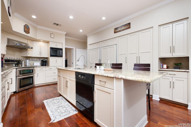 kitchen featuring crown molding, a sink, range hood, visible vents, and black appliances