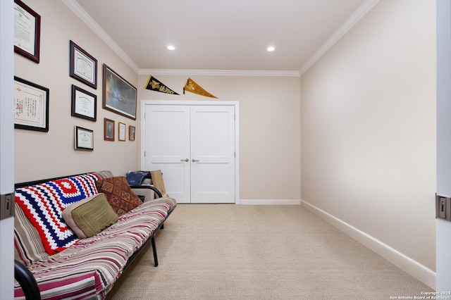 sitting room with crown molding, baseboards, carpet, and recessed lighting