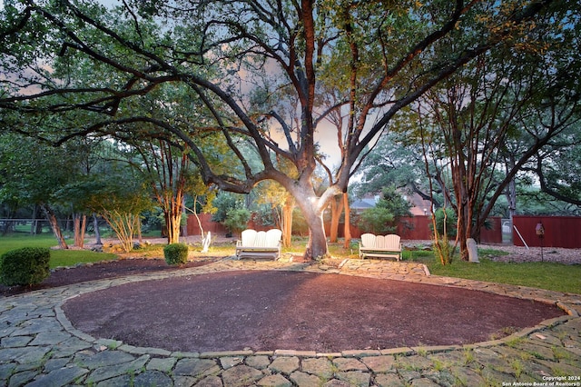 view of community with fence