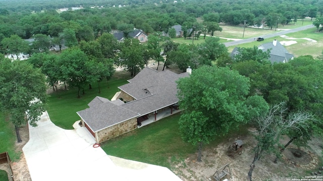 bird's eye view with a view of trees