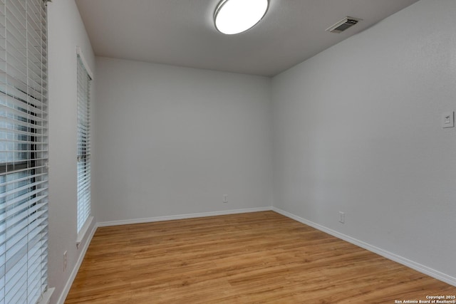 2215 Shady Rock Cir, San Antonio, TX 78231 - empty room featuring light wood-style floors and baseboards