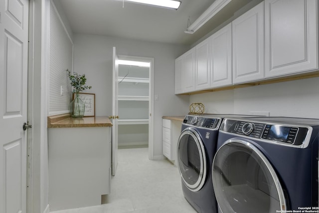 2215 Shady Rock Cir, San Antonio, TX 78231 - laundry room with cabinet space, separate washer and dryer, and light flooring