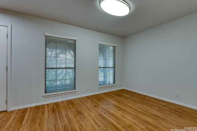 2215 Shady Rock Cir, San Antonio, TX 78231 - unfurnished room featuring light wood-style flooring and baseboards