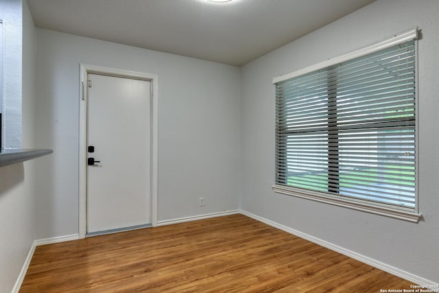 2215 Shady Rock Cir, San Antonio, TX 78231 - empty room featuring wood finished floors and baseboards