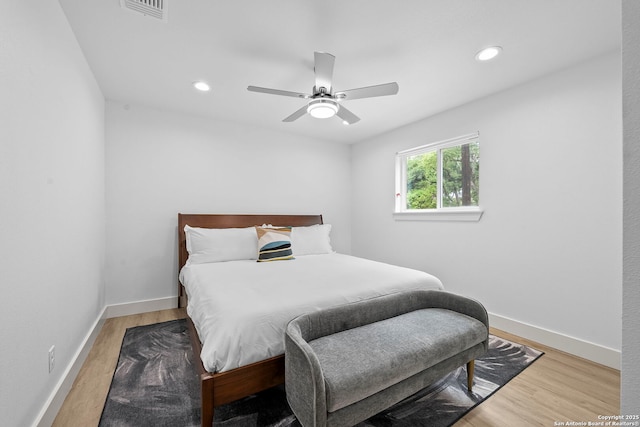 1050 Trail Pass Dr, Canyon Lake, TX 78133 - bedroom featuring recessed lighting, ceiling fan, visible vents, and light wood-style floors