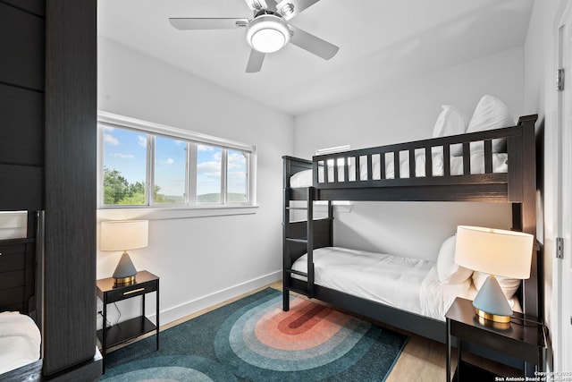 1050 Trail Pass Dr, Canyon Lake, TX 78133 - bedroom with a ceiling fan and baseboards