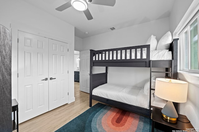 1050 Trail Pass Dr, Canyon Lake, TX 78133 - bedroom featuring visible vents, ceiling fan, wood finished floors, and a closet