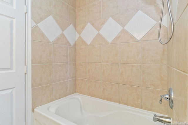 bathroom with shower / bathing tub combination