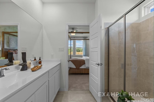 bathroom with ensuite bathroom, tile patterned flooring, a wealth of natural light, and a shower stall