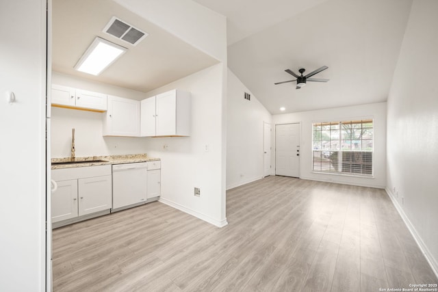 kitchen with visible vents, a ceiling fan, white dishwasher, white cabinetry, and a sink