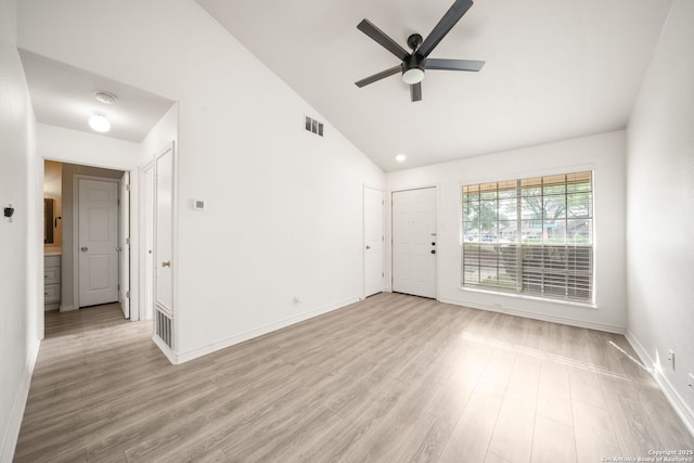 interior space with visible vents, light wood finished floors, ceiling fan, and baseboards