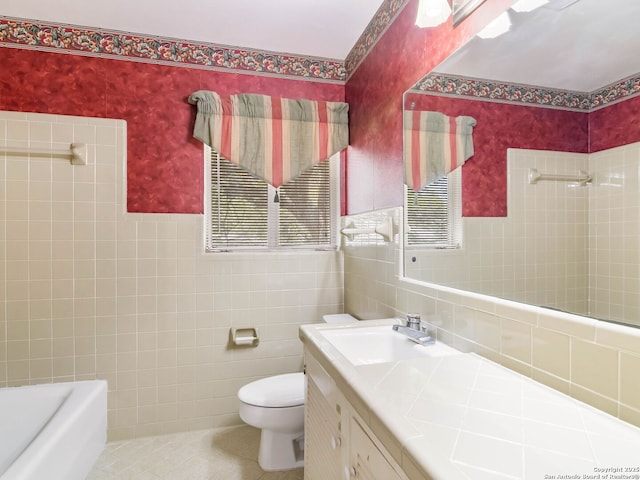 full bathroom featuring vanity, a shower, toilet, tile walls, and tile patterned floors