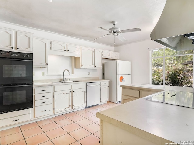 kitchen with white cabinets, a sink, ventilation hood, light countertops, and black appliances