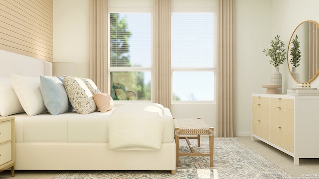 bedroom featuring light carpet