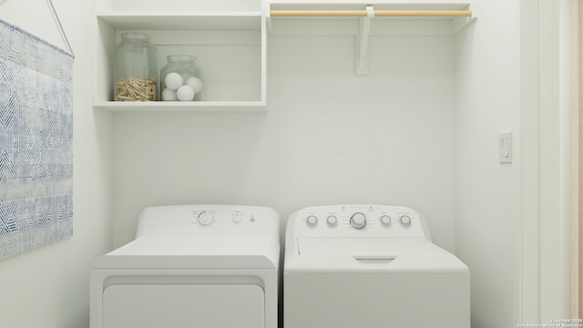 laundry area featuring separate washer and dryer and laundry area