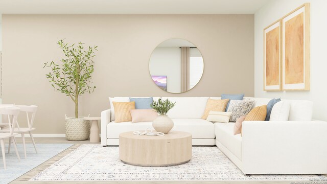 living room featuring baseboards