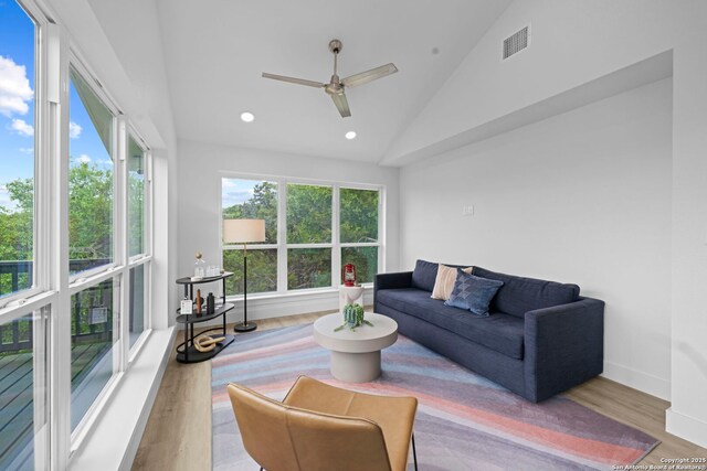 1880 Trail Pass Dr, Canyon Lake, TX 78133 - living area with high vaulted ceiling, recessed lighting, a ceiling fan, wood finished floors, and visible vents