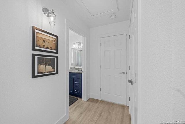 1880 Trail Pass Dr, Canyon Lake, TX 78133 - hall featuring baseboards and light wood-style flooring