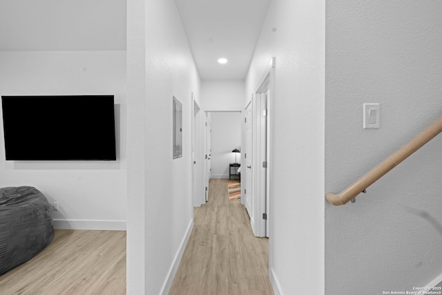 1880 Trail Pass Dr, Canyon Lake, TX 78133 - hallway featuring light wood-style floors, recessed lighting, baseboards, and electric panel