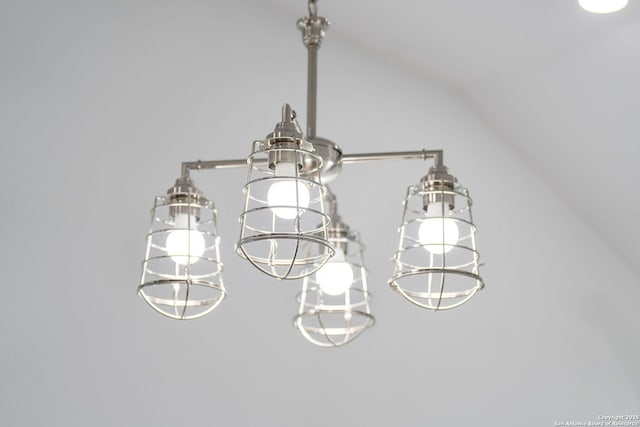 1880 Trail Pass Dr, Canyon Lake, TX 78133 - interior details with a notable chandelier