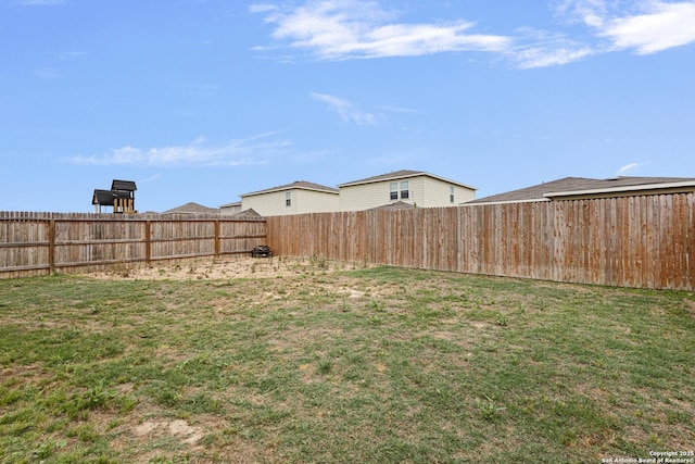 view of yard featuring a fenced backyard